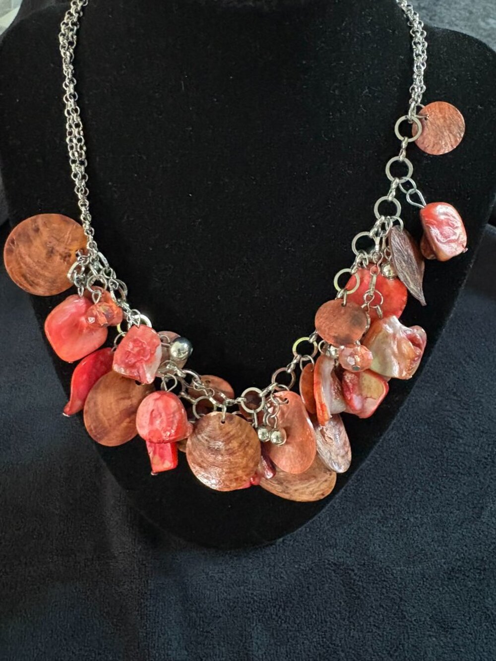 21 inch necklace with assorted beads and shells on silver chain